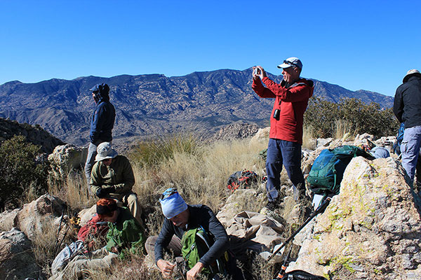 We enjoyed the summit views while sheltering as best we could from a cold wind