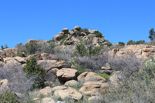 The Date Creek Mountains highpoint comes into view from the east