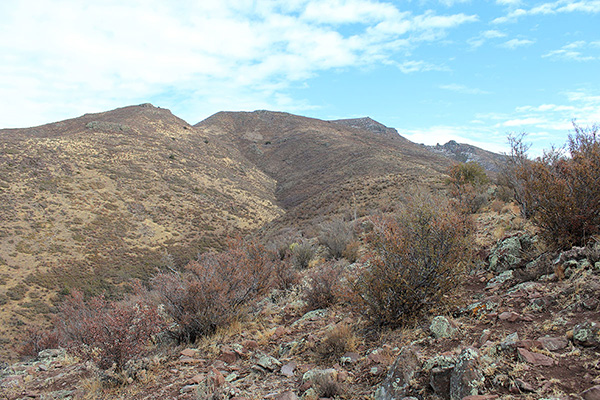 We followed the west ridge higher towards the summit on the right
