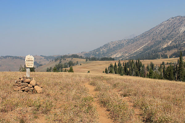 Our view towards distant Red Mountain obscured by smoke from the Cliff Creek Trail