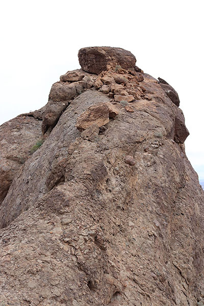 I decided not to try climbing these slabs with my mountaineering boots in wind and threatening showers