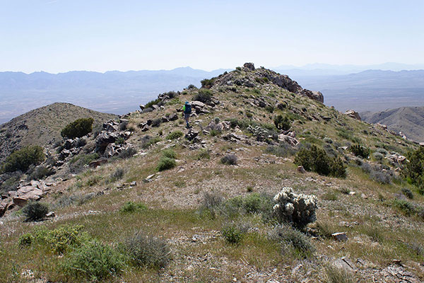 Eric approaches the summit cairn