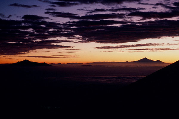Sunrise view towards Volcán La Malinche and Pico de Orizaba from Popocatepetl