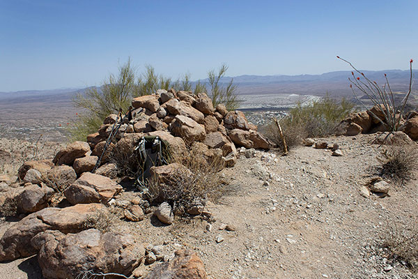 Peak 2976 summit with the town of Ajo below