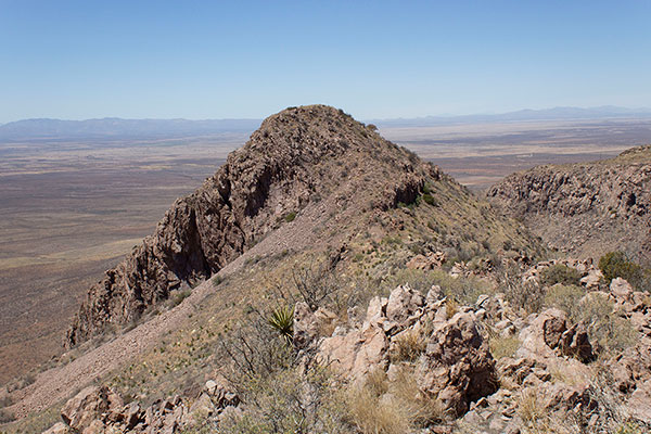 The South Perilla High Point lies to the north from Perilla Benchmark
