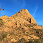 The summit tower of Baboquivari Peak illuminated by the setting sun